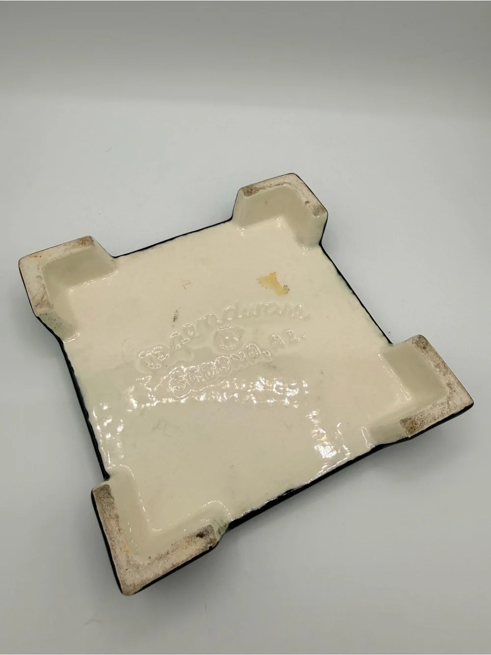 Vintage Legendware handcrafted ceramic roadrunner and cactus trivet.